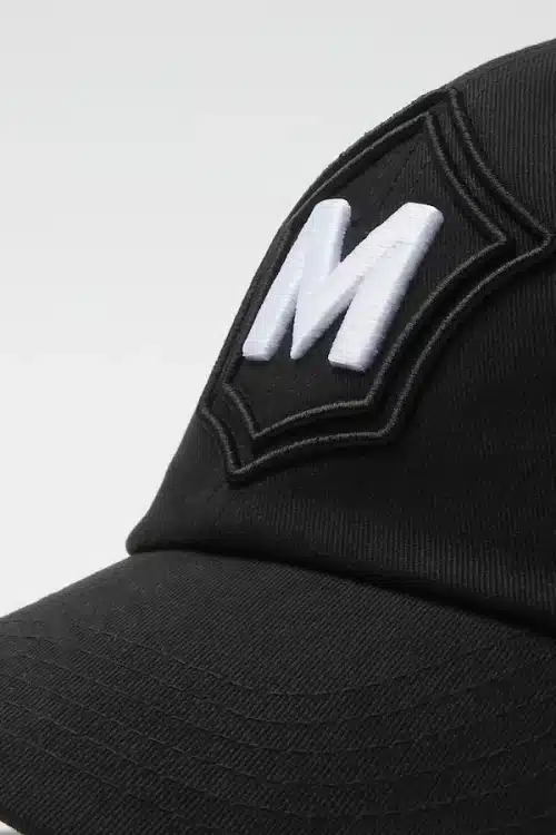 New Milanes Heritage Cap, black emboridery, timeless style.